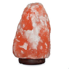 Spantik lit on nighttable illustrating calming amber light for relaxation