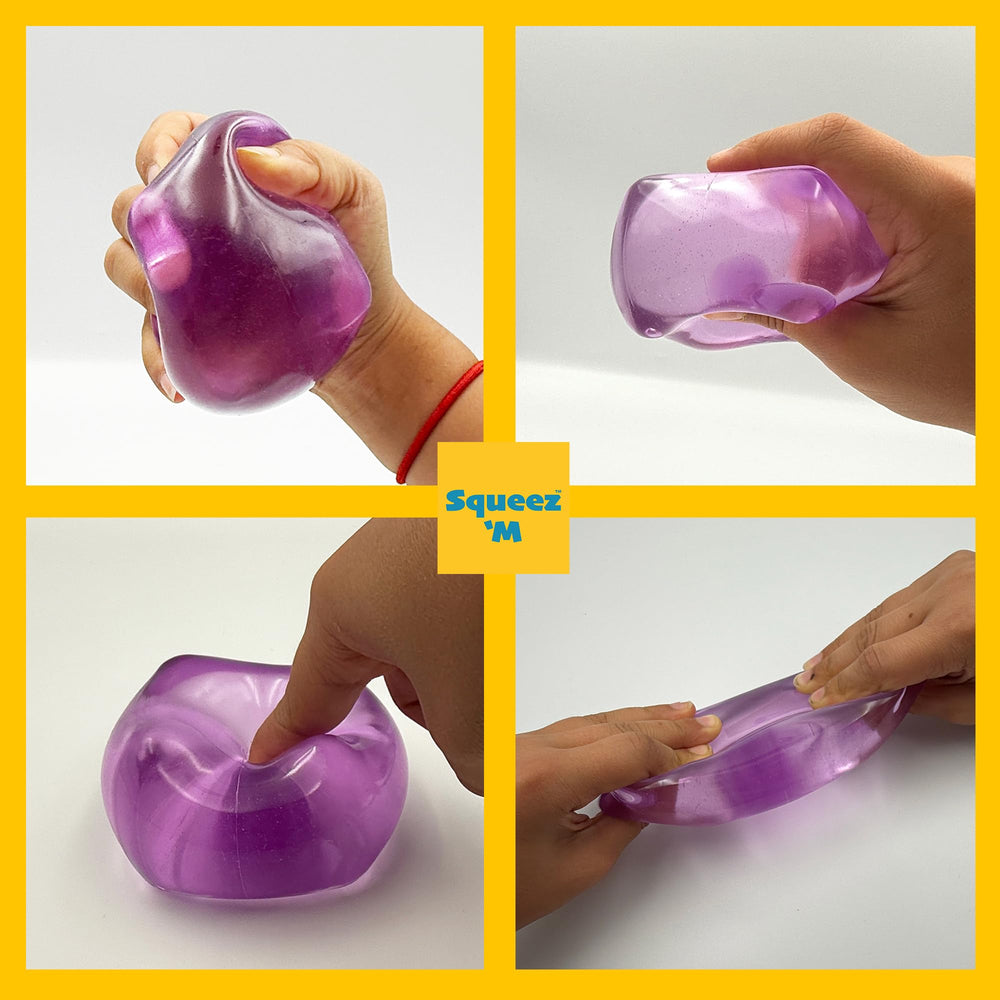 Squeez'M Big Block held in an adult hand showing scale and ergonomic grip