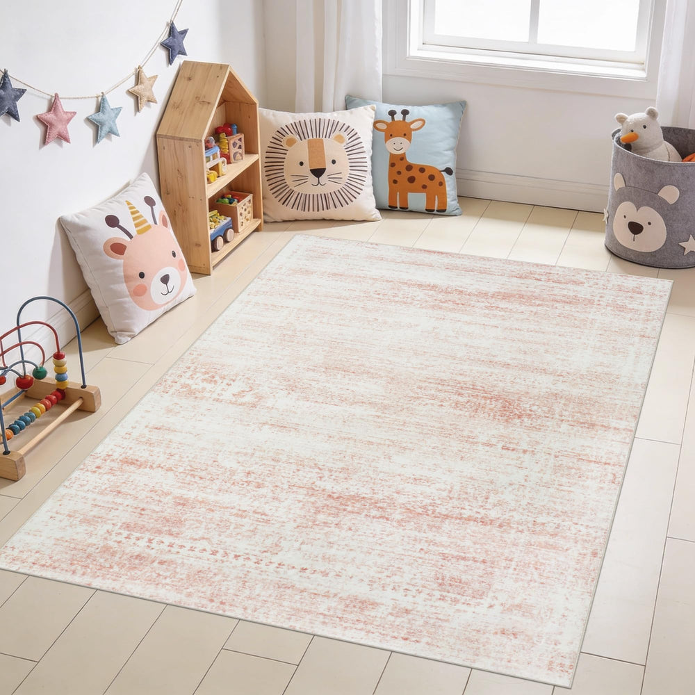 Srugn close-up of pink rug fibers shows cushioned soft texture for comfort