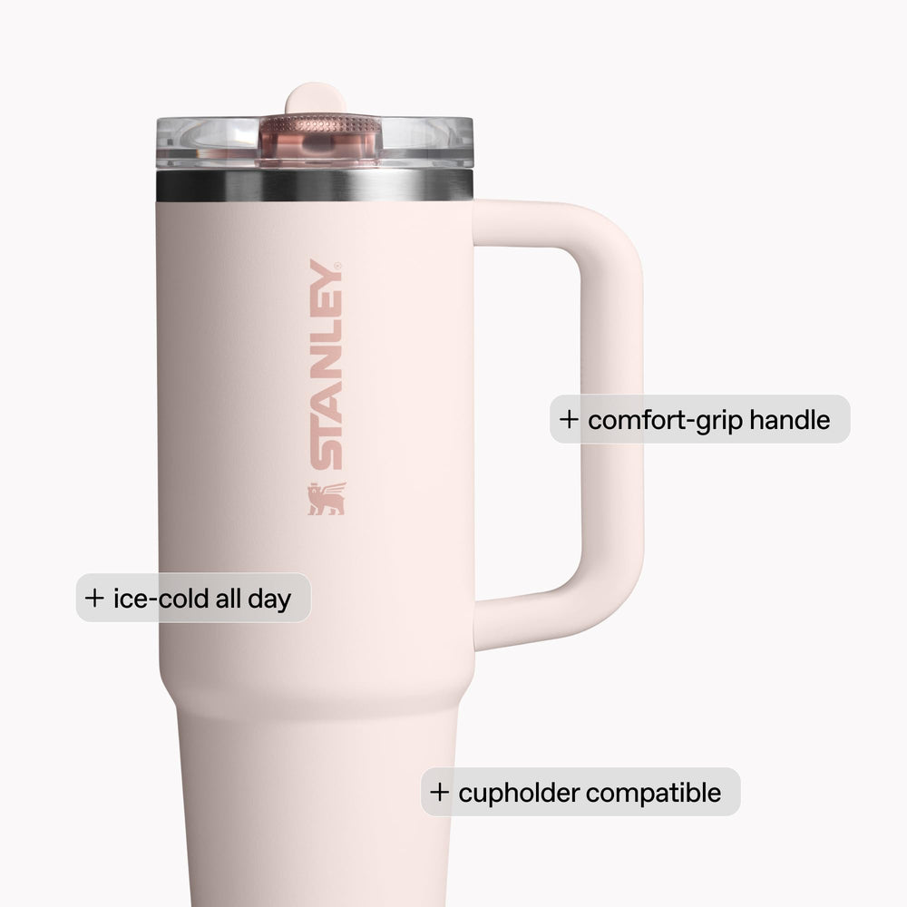 STANLEY Quencher seated in car cup holder showing travel-friendly narrow base