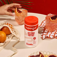 Supergut mixed drink in glass over ice illustrating refreshing, enjoyable fiber boost