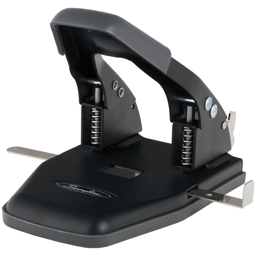 Swingline on a tidy desk in use showing workplace efficiency benefit
