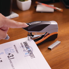 Swingline Optima 40 side profile next to ruler showing compact size benefit