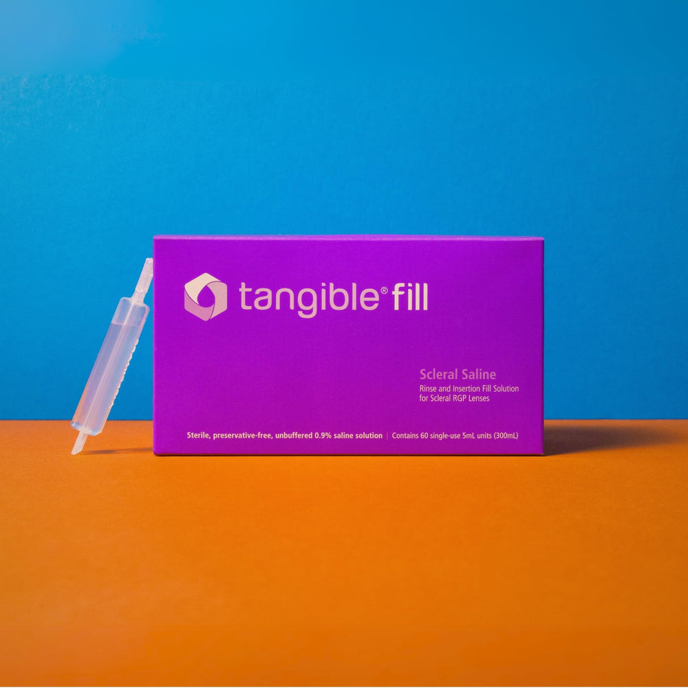 Tangible vial next to coin for scale showing compact travel convenience