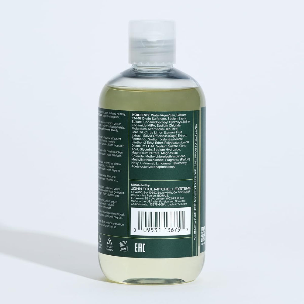 Tea Tree champú en ambiente de baño evocando frescura y energía
