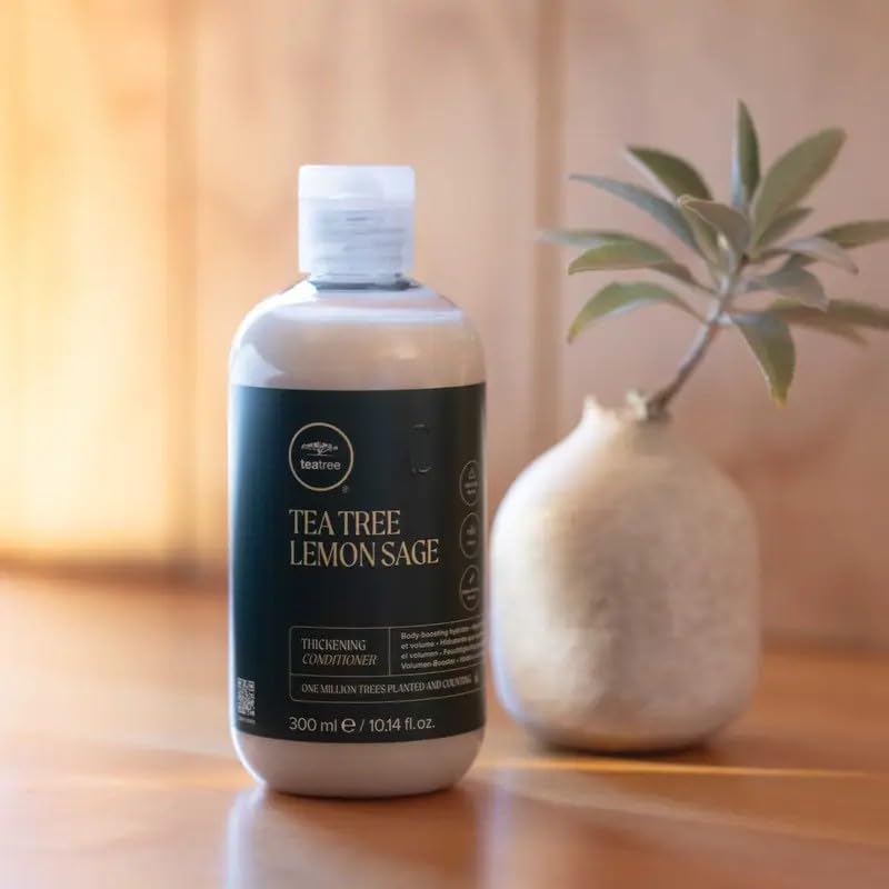 Tea Tree envase junto a regla para comparar tamaño práctico de 10.14 fl oz