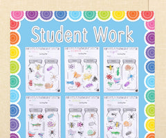 Teacher Created Resources rollo instalado en tablero escolar con trabajos pegados para organización efectiva
