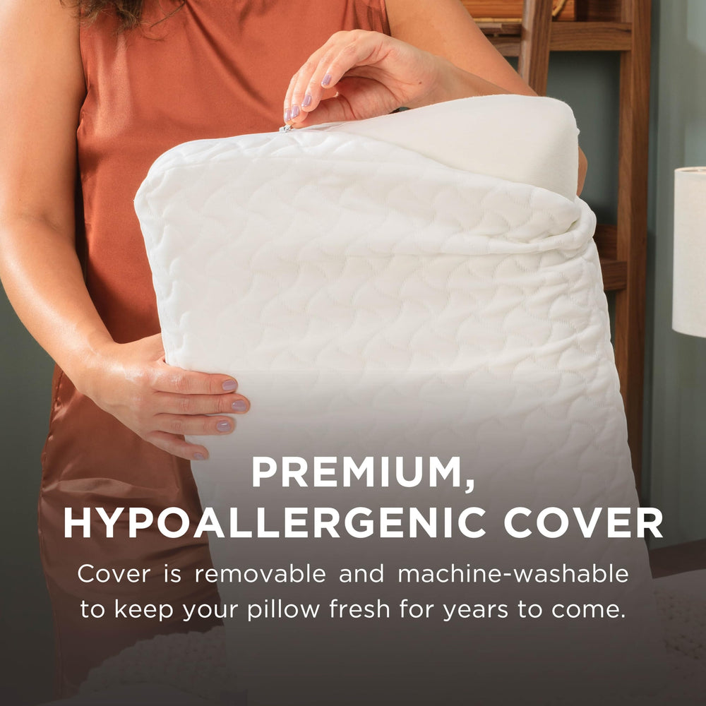 Tempur-Pedic pillow beside ruler showing standard size for easy scale reference