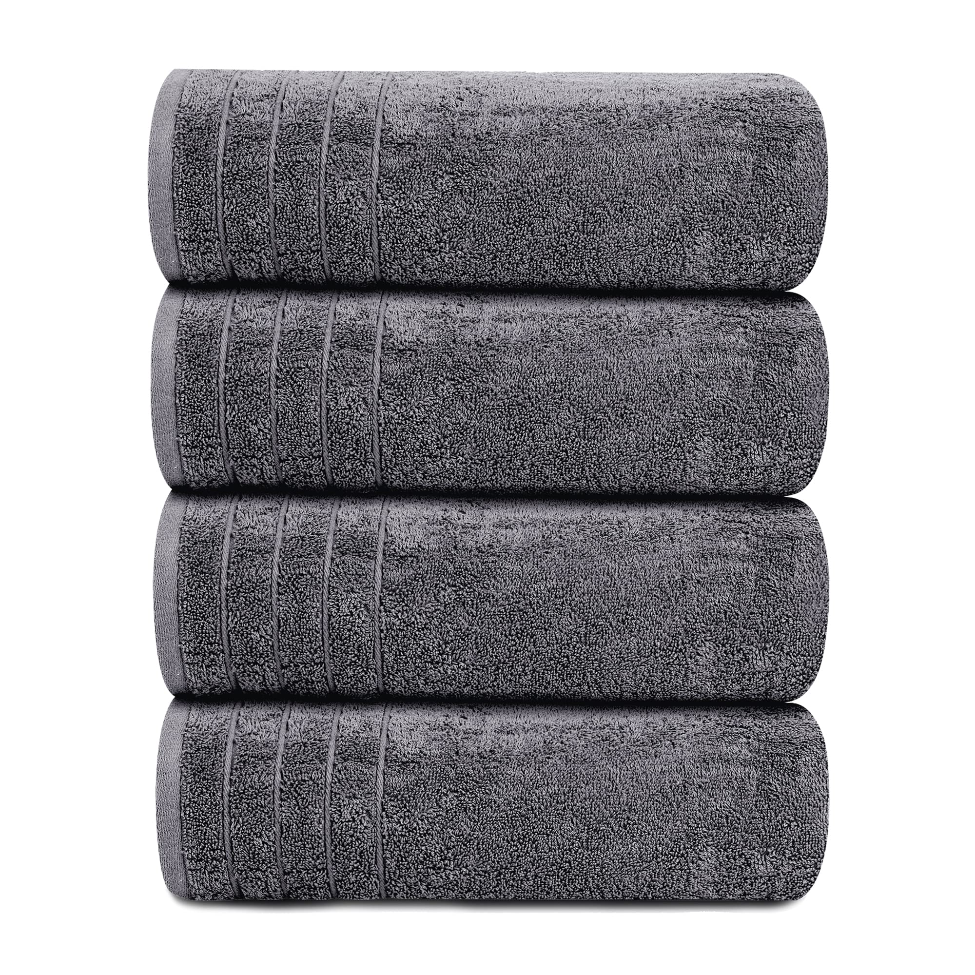 Tens Towels apiladas en un baño decorado, mostrando aspecto ordenado y resistencia al uso diario