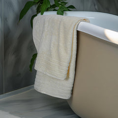 Tens Towels comparación de tamaño con una toalla estándar, mayor cobertura visible