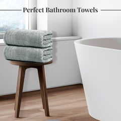 Tens Towels comparación de tamaño junto a una regla demostrando las 30 x 60 pulgadas útiles