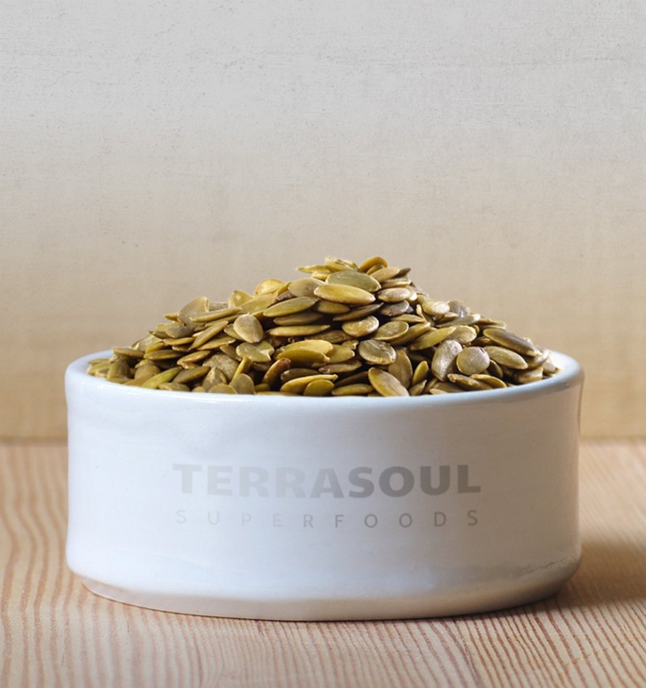 Terrasoul Superfoods pumpkin seeds sprinkled on salad demonstrating added crunch