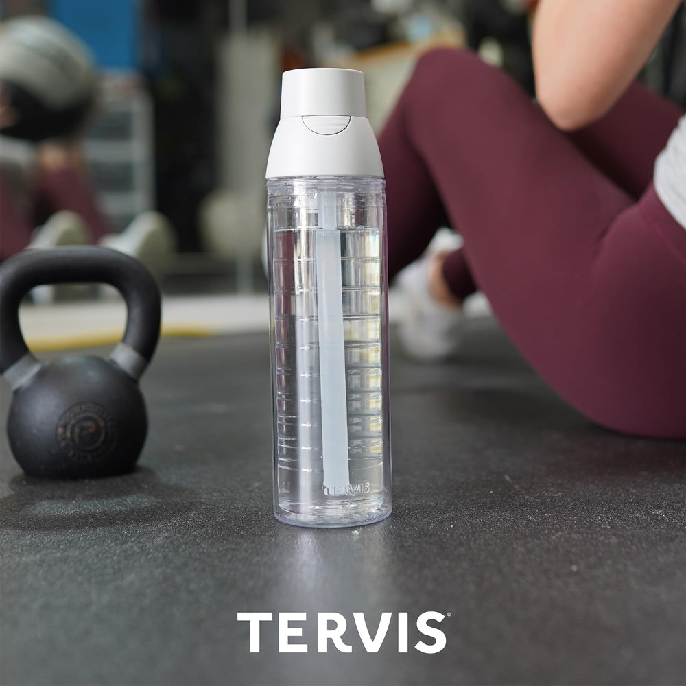 Tervis side view next to a phone showing 24oz size and cupholder fit