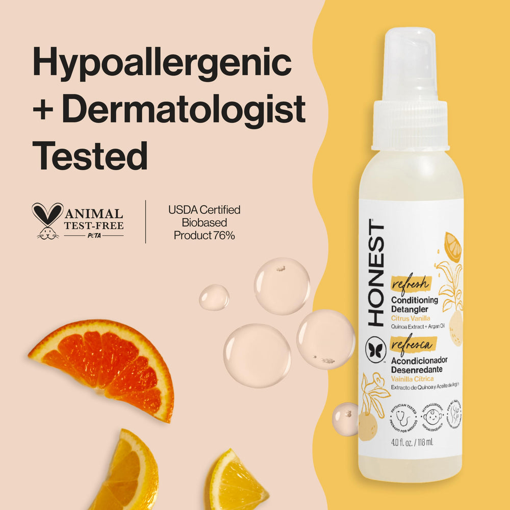 The Honest Company mist spray nozzle close-up delivering even detangling coverage