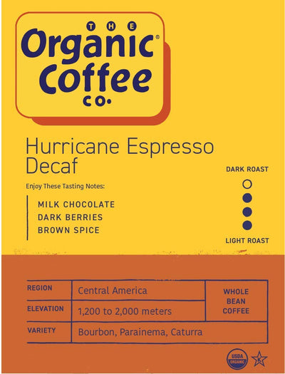 The Organic Coffee Co. decaf whole bean close-up revealing roast color and texture for freshness