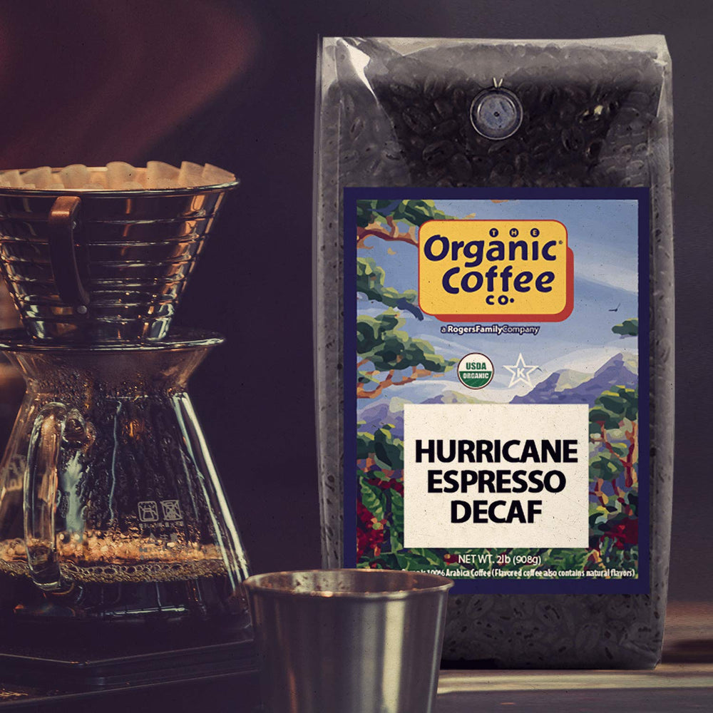 The Organic Coffee Co. 2 lb bag beside a kitchen scale showing size and value for shoppers