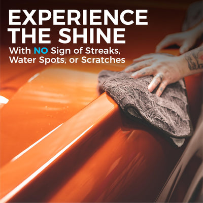 The Rag Company Gauntlet drying a vehicle window streak-free for clarity