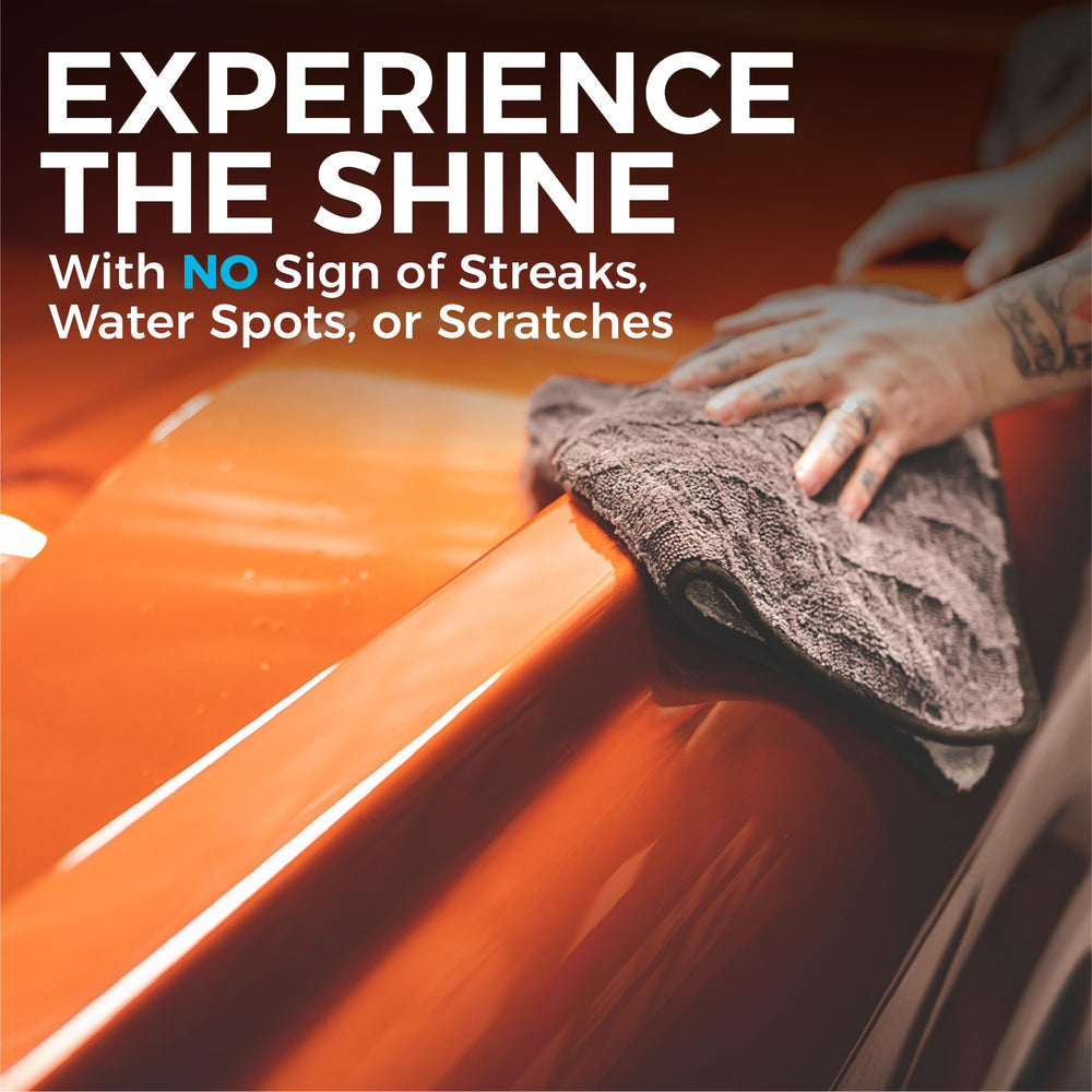 The Rag Company Gauntlet drying a vehicle window streak-free for clarity