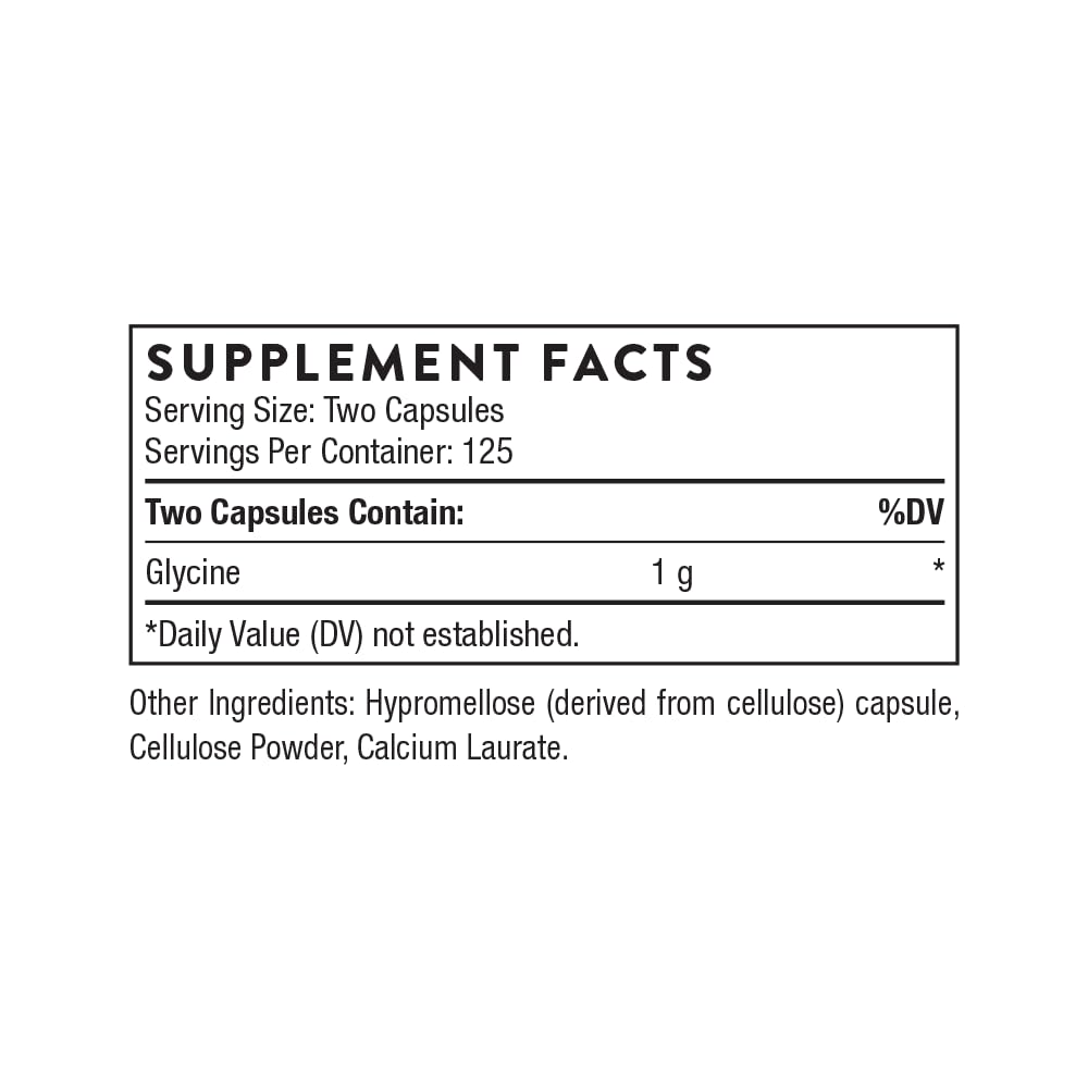 THORNE closeup of white glycine capsules highlighting pill shape and purity