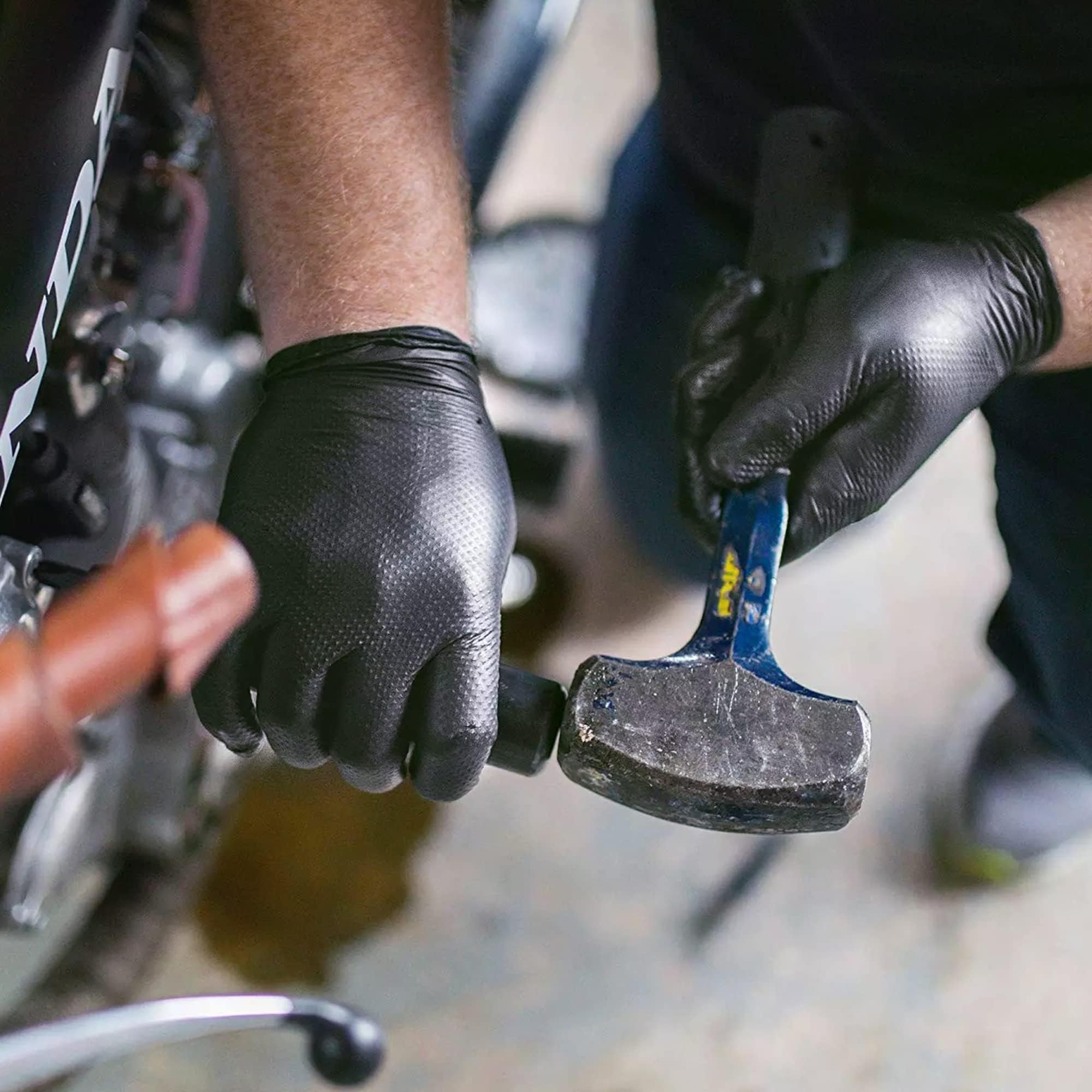TitanFlex guantes doblados mostrando variedad de tallas disponibles para ajustarse