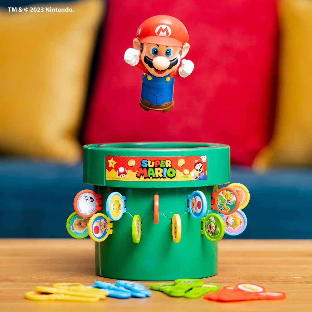 TOMY vista de las piezas e instrucciones, enseña montaje sencillo
