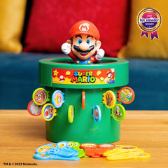 TOMY tubería con figura de Mario emergiendo, foco en sorpresa y acción