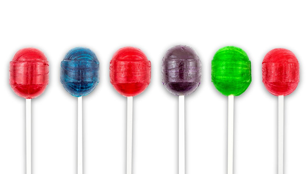 Tootsie Charms Super Blow Pop en mesa de fiesta, ideal para bolsitas y decoración
