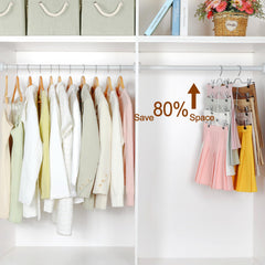 TOPIA HANGER primer plano de pinzas con recubrimiento que protege prendas