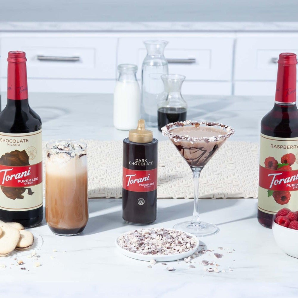 Torani bottle pouring dark chocolate sauce demonstrating smooth texture benefit