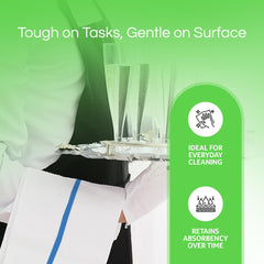 Towels N More wiping a kitchen counter demonstrating streak-free drying and quick cleanup benefit