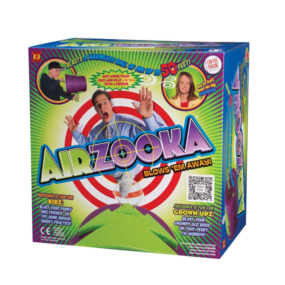 Toysmith Airzooka comparación de tamaño junto a una regla para escala