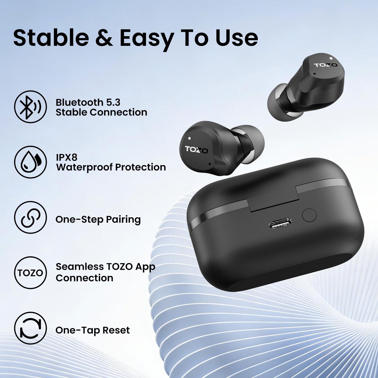 TOZO NC9 en mano para comparar tamaño y portabilidad