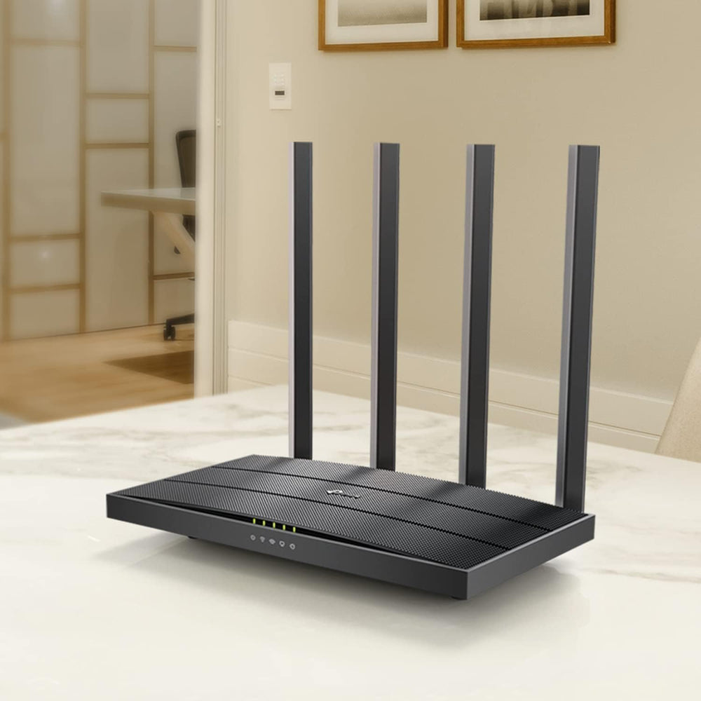 TP-Link Archer A6 comparación de tamaño junto a objetos para ver escala real