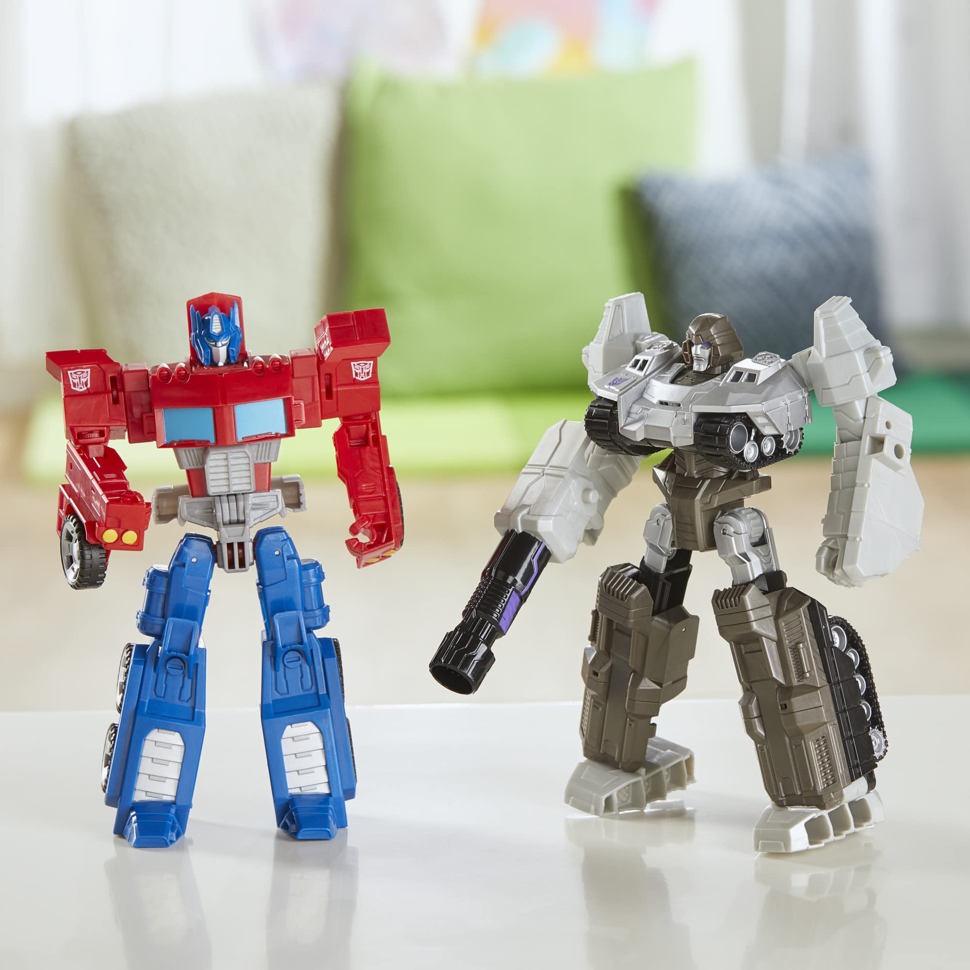 Transformers Optimus Prime truck mode next to a ruler for scale, brand showing size benefit