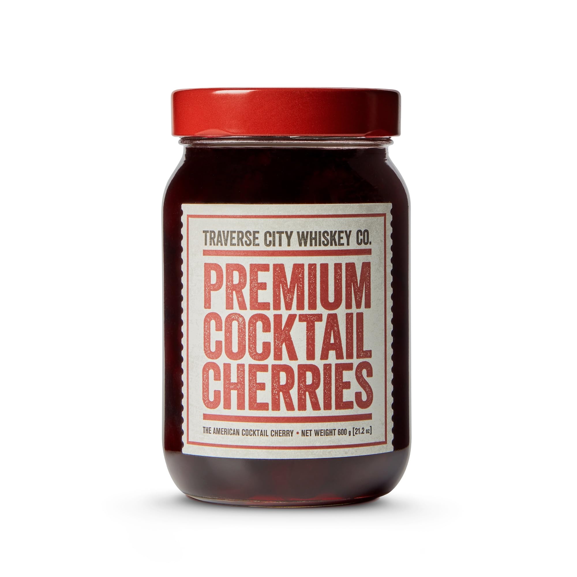 TRAVERSE CITY WHISKEY CO. frasco frontal mostrando cerezas grandes y atractivas