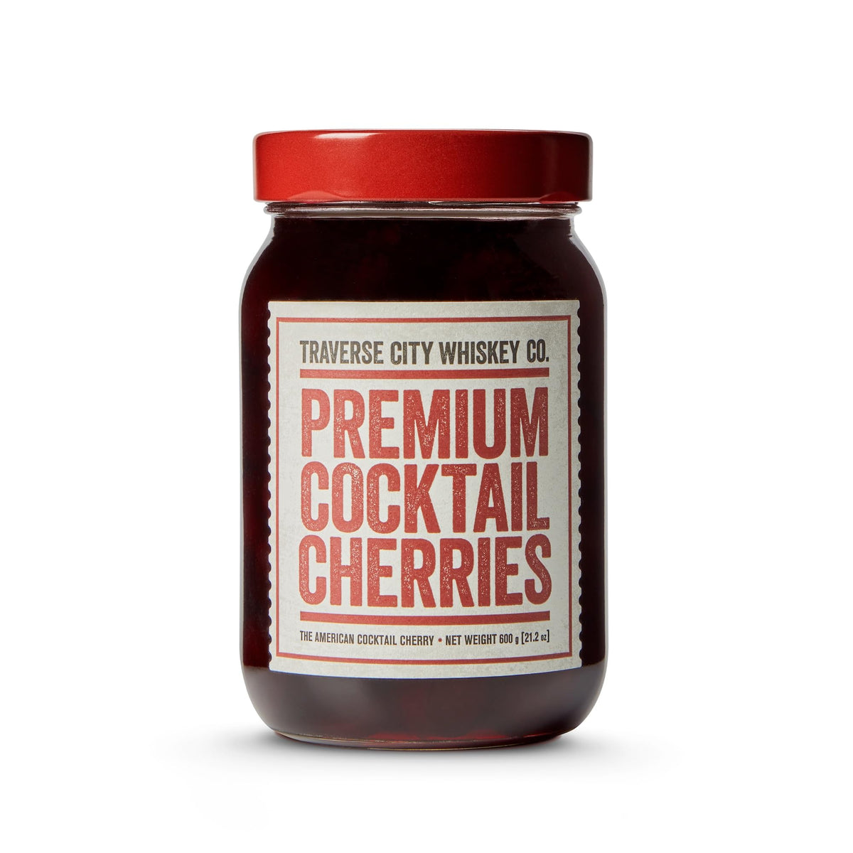 TRAVERSE CITY WHISKEY CO. frasco frontal mostrando cerezas grandes y atractivas