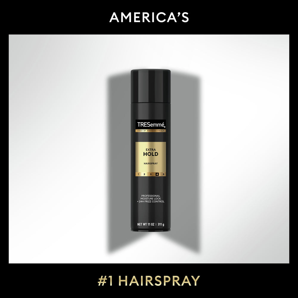 TRESemmé can in hand being sprayed to set a styled look quickly