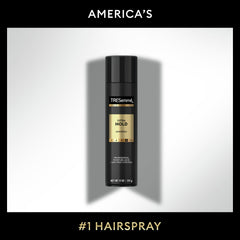 TRESemmé can in hand being sprayed to set a styled look quickly