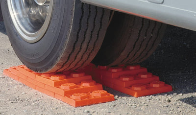 Tri-Lynx leveling kit at campsite offering comfort and appliance leveling
