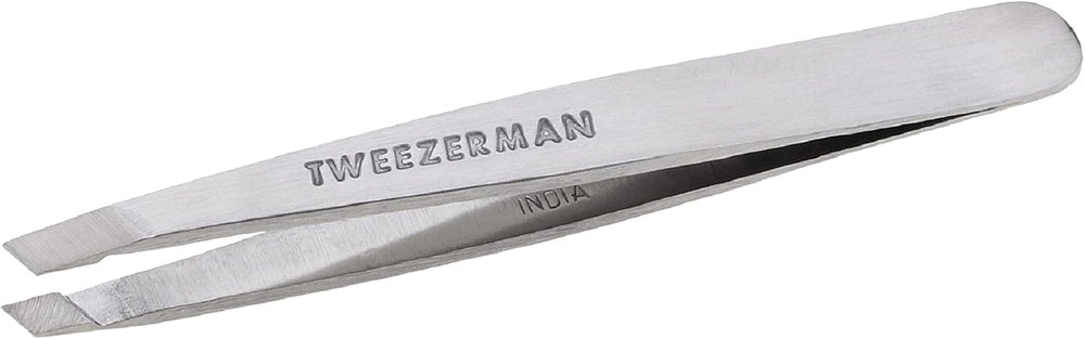 Tweezerman mini slant frente del empaque mostrando diseño profesional