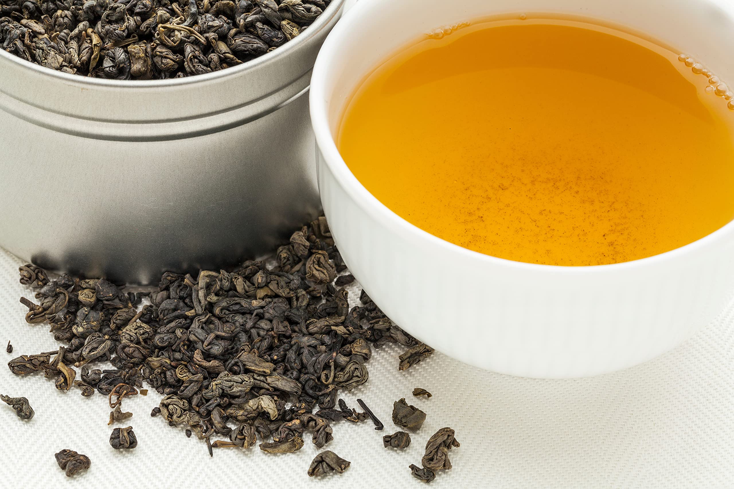 U.S. Wellness Naturals comparación de tamaño con cucharita para porciones