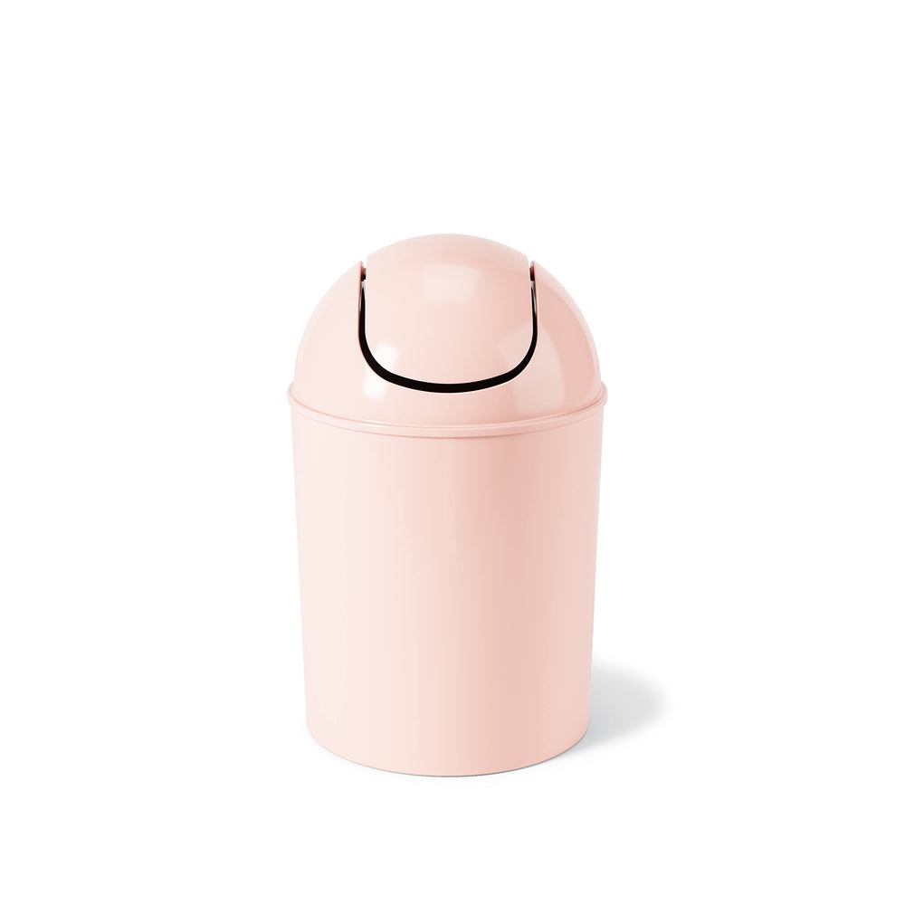Umbra mini bote en baño junto a lavabo, ahorra espacio