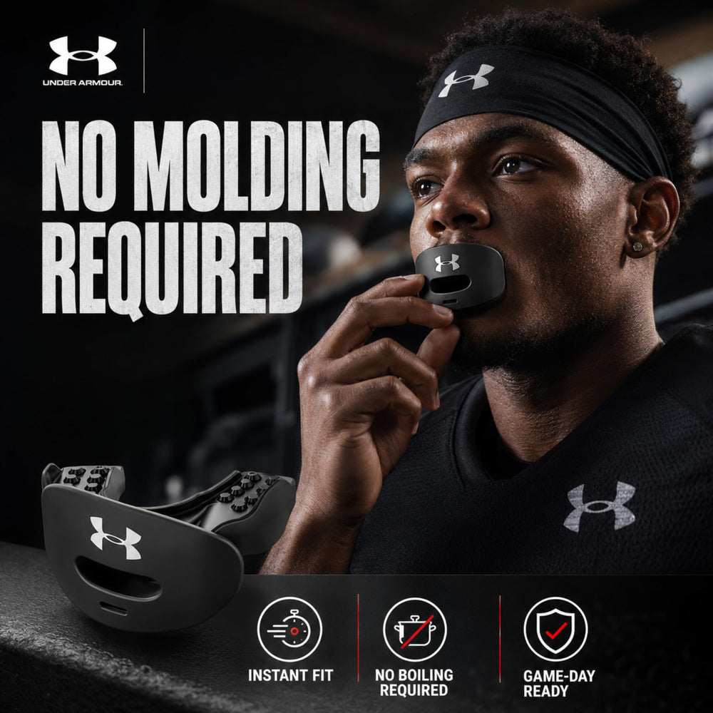 Under Armour comparación de tamaño del protector junto a una regla para escala
