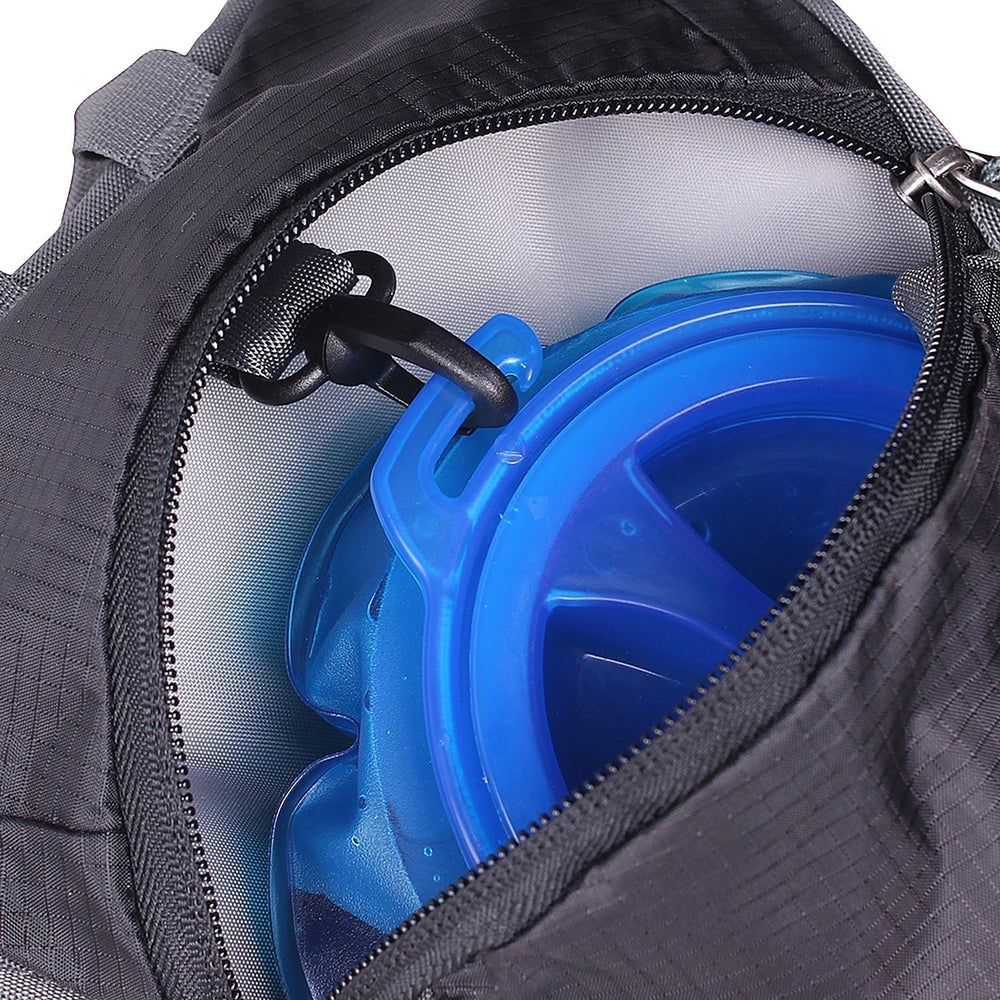 Unigear pack beside standard water bottle showing compact capacity and scale