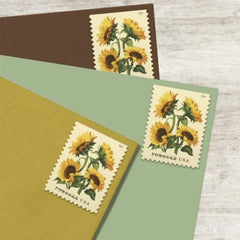 United States Postal Service sello Sunflowers pegado en sobre, facilita envíos elegantes