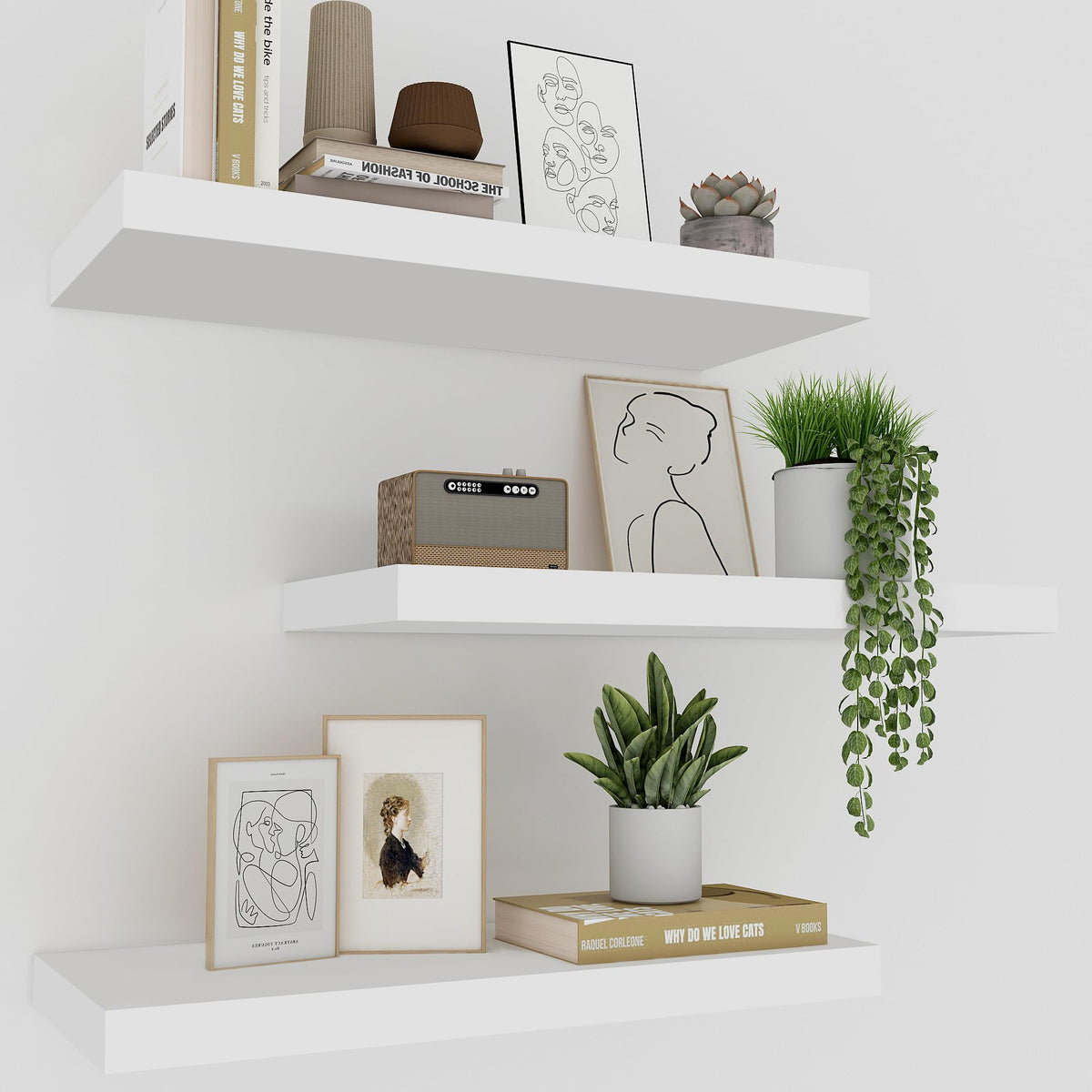 Upassion front view of three white floating shelves showing clean minimalist look and storage