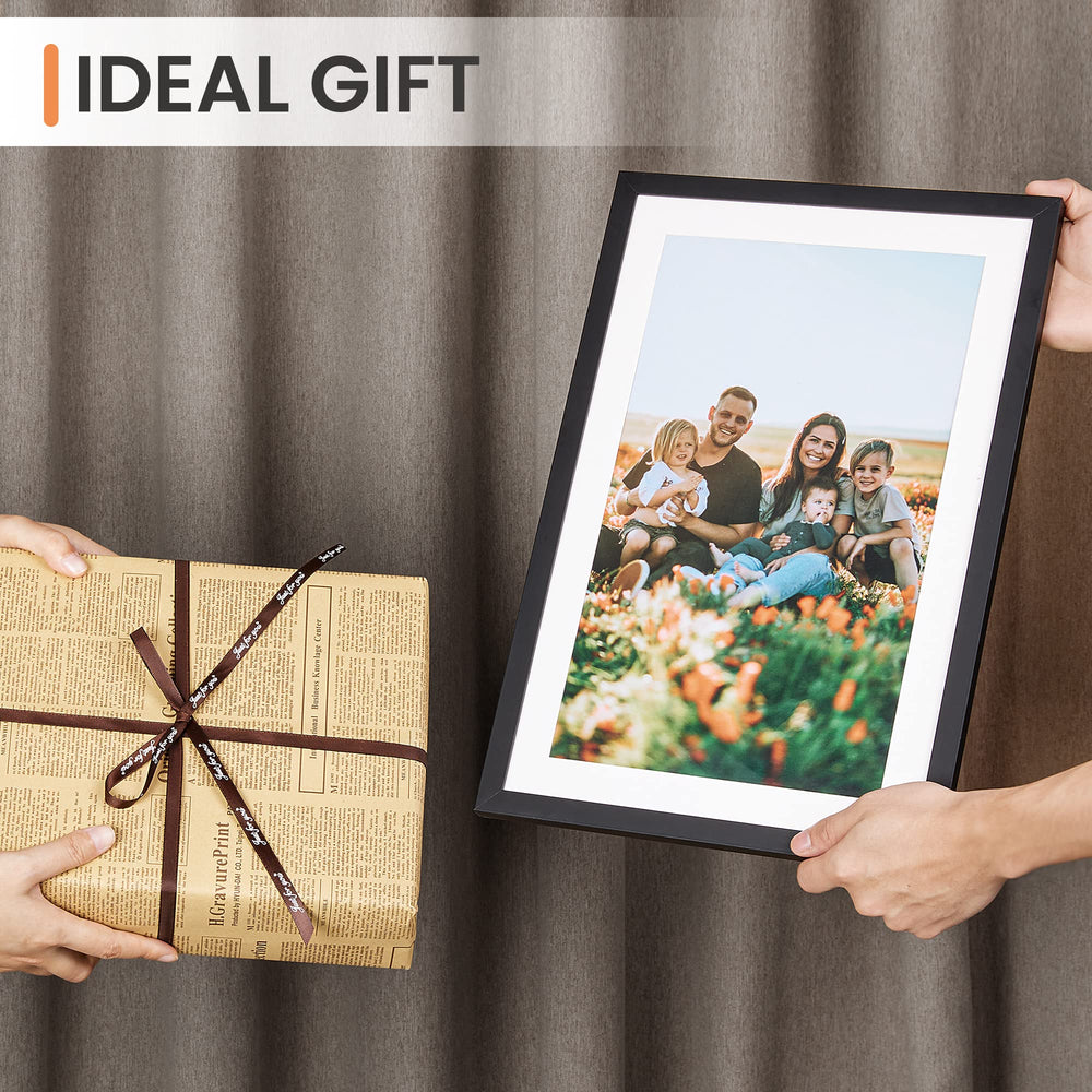 upsimples frame held by hands showing 11x17 scale for placement planning benefit