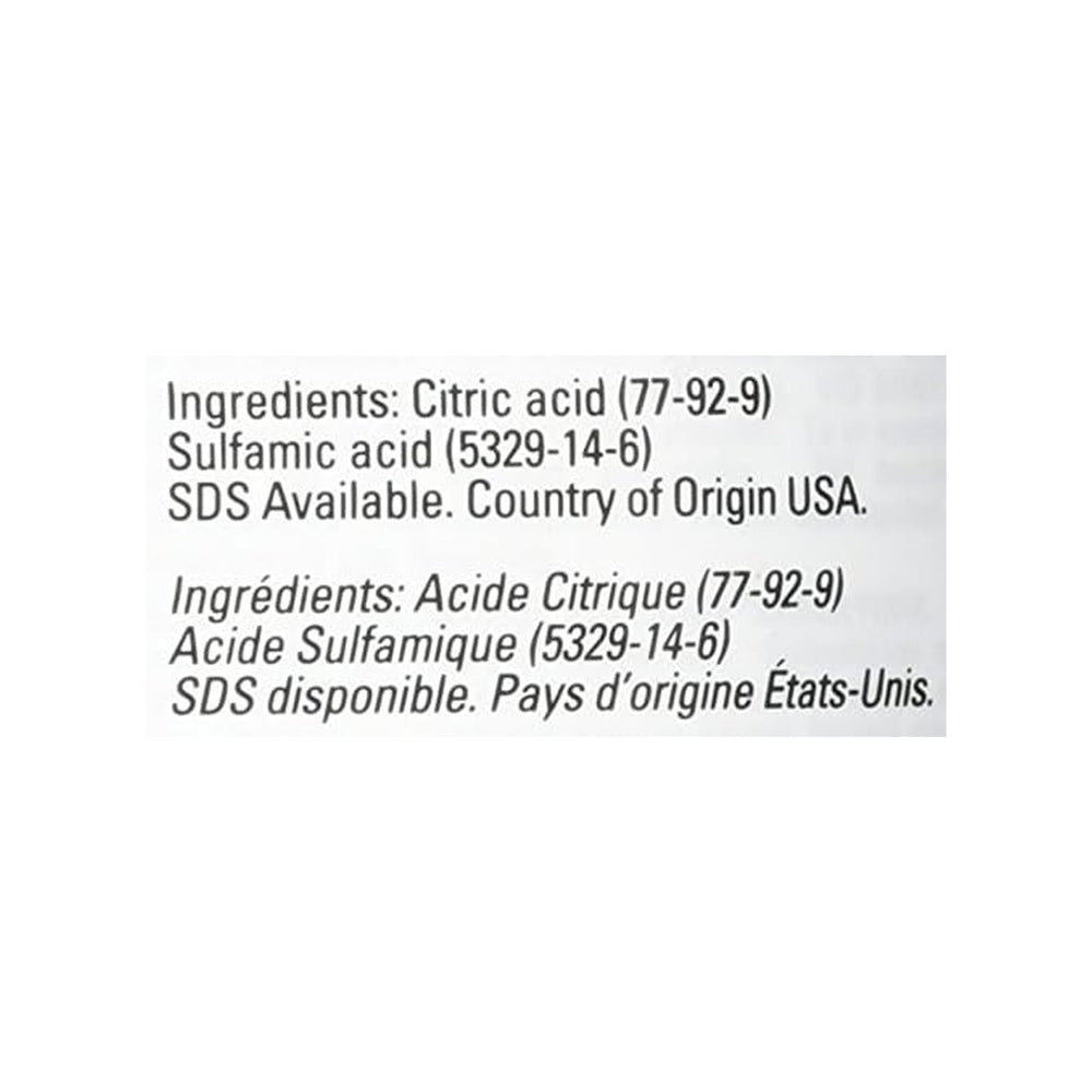 Urnex Dezcal bottle beside kettle to show compatibility and scale removal