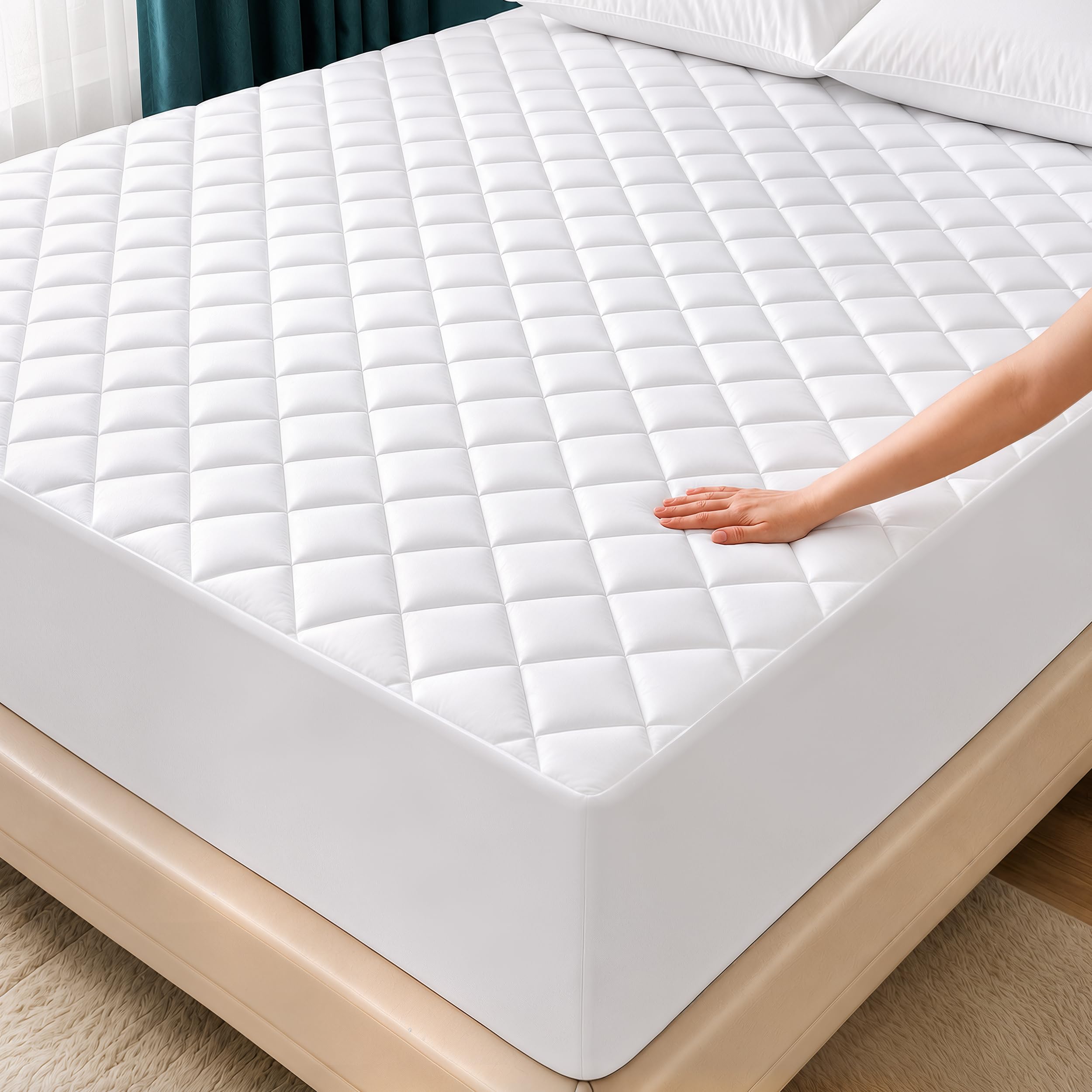Utopia Bedding frente del protector acolchado mostrando el embalaje y aspecto limpio