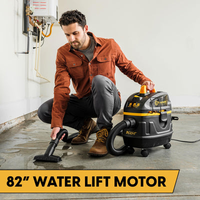 Vacmaster VFB511H cleaning a garage, brand power for workshop cleanup